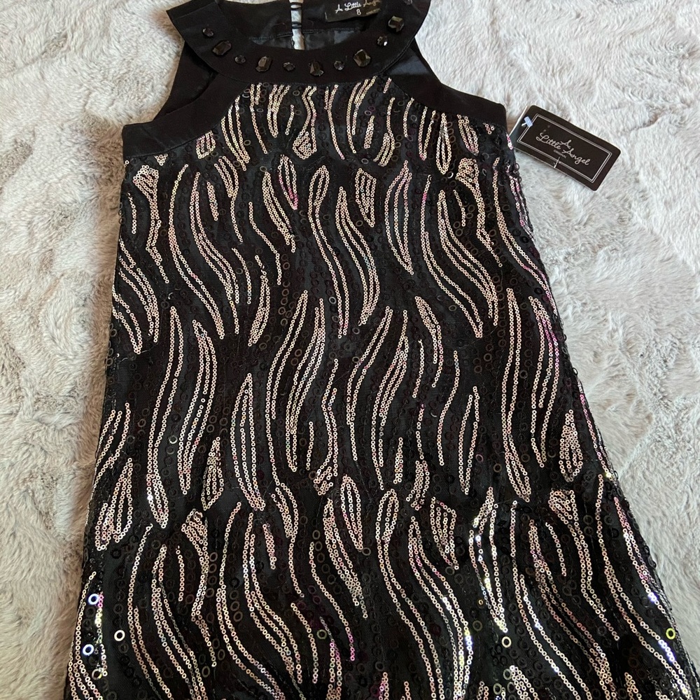 A little angel original  tags still on size 8